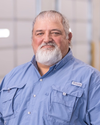 portrait of a person wearing a button down shirt